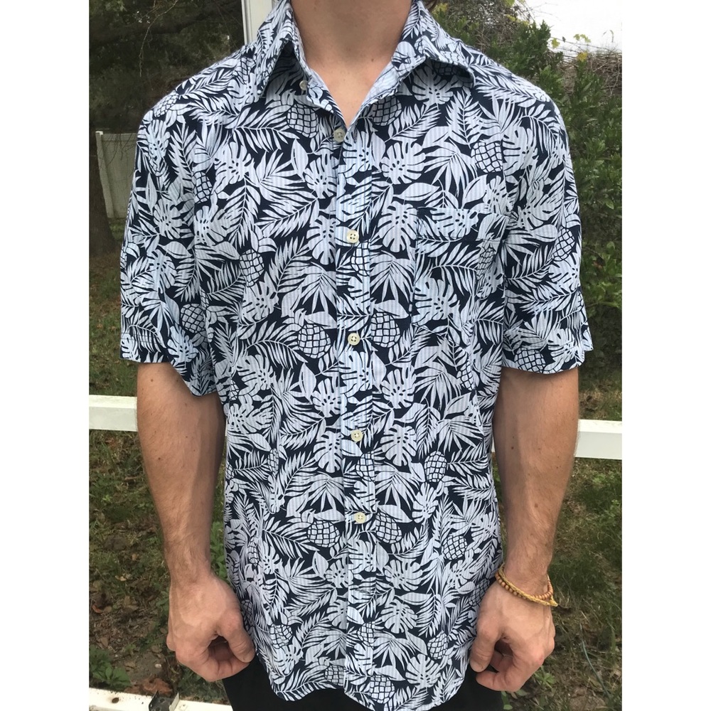 Blue/White Collared button up shirt.